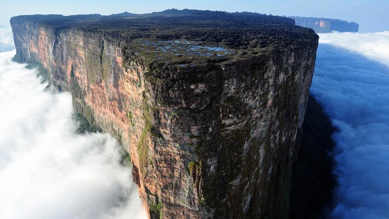 The cliffs of Mount Roraima, Venezuela, rising out of the clouds